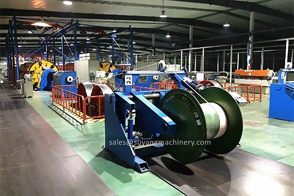 cantilever type take up machine